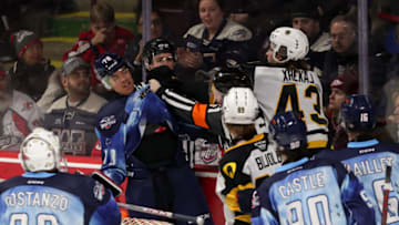 WINDSOR, ONTARIO - FEBRUARY 04: Forward Florian Xhekaj #43 of the Hamilton Bulldogs battles against defenceman Rodwin Dionicio #78 of the Windsor Spitfires at the WFCU Centre on February 4, 2023 in Windsor, Ontario, Canada. (Photo by Dennis Pajot/Getty Images)