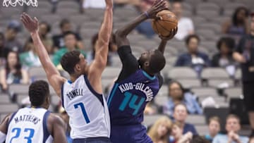Oct 3, 2016; Dallas, TX, USA; Dallas Mavericks forward Dwight Powell (7) defends against Charlotte Hornets forward Michael Kidd-Gilchrist (14) during the first quarter at the American Airlines Center. Mandatory Credit: Jerome Miron-USA TODAY Sports
