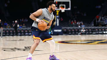 Jamal Murray #27 of the Denver Nuggets works out before the game against the Washington Wizards at Ball Arena on 13 Dec., 2021 in Denver, Colorado. (Photo by C. Morgan Engel/Getty Images)