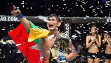 YANGON, MYANMAR - JUNE 30: Aung La N Sang celebrates his historic title win, claiming the ONE Middleweight World Championship during ONE Championship Light Of A Nation at the Thuwunna Indoor Stadium on June 30, 2017 in Yangon, Myanmar. (Photo by David Ash/ONE Championship/Getty Images)