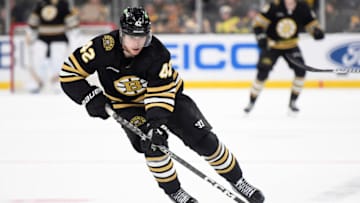 Sep 29, 2023; Boston, Massachusetts, USA; Boston Bruins center Georgii Merkulov (42) skates with the puck during the third period against the Philadelphia Flyers at TD Garden. Mandatory Credit: Bob DeChiara-USA TODAY Sports