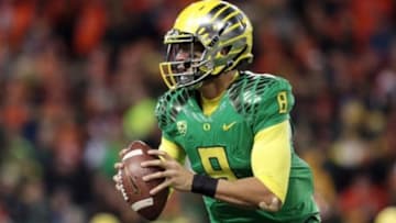 Nov 29, 2014; Corvallis, OR, USA; Oregon Ducks quarterback Marcus Mariota (8) runs the ball against the Oregon State Beavers at Reser Stadium. Mandatory Credit: Scott Olmos-USA TODAY Sports
