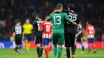 MADRID, SPAIN - OCTOBER 31: Jan Oblak of Atletico Madrid and Elvin Yunuszada of Qarabag FK hug after the UEFA Champions League group C match between Atletico Madrid and Qarabag FK at Estadio Wanda Metropolitano on October 31, 2017 in Madrid, Spain. (Photo by Denis Doyle/Getty Images)