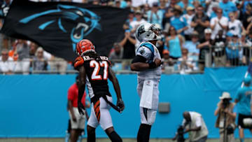 Former Auburn QB Cam Newton celebrates a touchdown with Carolina on Sunday in front of former Alabama DB Dre Kirkpatrick. (Photo by Streeter Lecka/Getty Images)