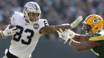 Oakland Raiders tight end Darren Waller (83) stiff arms Green Bay Packers strong safety Adrian Amos (31) during their football game Sunday, October 20, 2019, at Lambeau Field in Green Bay, Wis.Wm. Glasheen/USA TODAY NETWORK-WisconsinApc Packers Vs Raiders 0771 102019 Wag