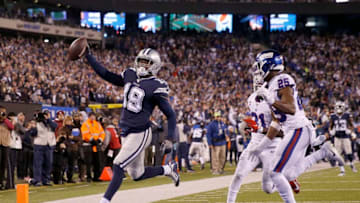 EAST RUTHERFORD, NEW JERSEY - NOVEMBER 04: Amari Cooper #19 of the Dallas Cowboys celebrates his touchdown in the fourth quarter as Corey Ballentine #25 and Michael Thomas #31 of the New York Giants defends at MetLife Stadium on November 04, 2019 in East Rutherford, New Jersey.The Dallas Cowboys defeated the New York Giants 37-18. (Photo by Elsa/Getty Images)