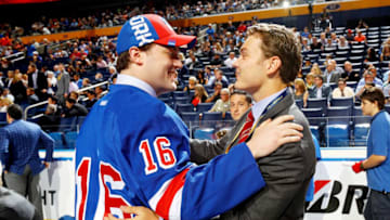 BUFFALO, NY - JUNE 25: Sean Day reacts after being selected 81st by the New York Rangers during the 2016 NHL Draft on June 25, 2016 in Buffalo, New York. (Photo by Bruce Bennett/Getty Images)