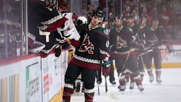 GLENDALE, ARIZONA - JANUARY 12: Conor Garland #83 of the Arizona Coyotes celebrates with teammates on the bench after scoring a goal against the Pittsburgh Penguins during the first period of the NHL game at Gila River Arena on January 12, 2020 in Glendale, Arizona. (Photo by Christian Petersen/Getty Images)