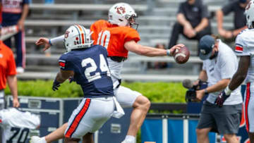 Auburn football quarterback Bo Nix (10) extends the ball for the goal line during Auburn football A-Day spring game at Jordan-Hare Stadium in Auburn, Ala., on Saturday, April 17, 2021.