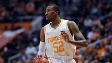 Dec 18, 2013; Knoxville, TN, USA; Tennessee Volunteers guard Jordan McRae (52) brings the ball up court against the North Carolina State Wolfpack during the first half at Thompson-Boling Arena. Mandatory Credit: Randy Sartin-USA TODAY Sports