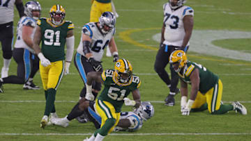 GREEN BAY, WISCONSIN - DECEMBER 19: Krys Barnes #51 of the Green Bay Packers reacts to a defensive stop during a game against the Carolina Panthers at Lambeau Field on December 19, 2020 in Green Bay, Wisconsin. The Packers defeated the Panthers 24-16. (Photo by Stacy Revere/Getty Images)