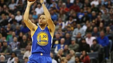 (EDITORS NOTE: CAPTION CORRECTION) Nov 22, 2015; Denver, CO, USA; Golden State Warriors guard Stephen Curry (30) shoots the ball during the second half against the Denver Nuggets at Pepsi Center. The Warriors won 118-105. Mandatory Credit: Chris Humphreys-USA TODAY Sports