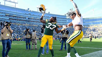GREEN BAY, WISCONSIN - OCTOBER 20: Aaron Jones #33 of the Green Bay Packers and Jamaal Williams #30 of the Green Bay Packers celebrate after the game against the Oakland Raiders at Lambeau Field on October 20, 2019 in Green Bay, Wisconsin. (Photo by Quinn Harris/Getty Images)