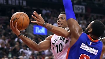 Oct 26, 2016; Toronto, Ontario, CAN; Toronto Raptors guard DeMar DeRozan (10) goes up for a basket past Detroit Pistons center Andre Drummond (0) in the second half at Air Canada Centre. Mandatory Credit: Dan Hamilton-USA TODAY Sports