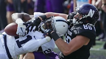 EVANSTON, IL - OCTOBER 07: Amani Oruwariye #21 of the Penn State Nittany Lions intercepts a pass intended for Bennett Skowronek #88 of the Northwestern Wildcats at Ryan Field on October 7, 2017 in Evanston, Illinois. (Photo by Jonathan Daniel/Getty Images)