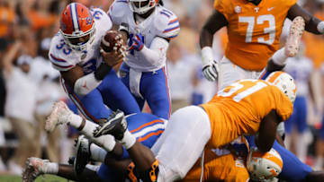 KNOXVILLE, TN - SEPTEMBER 22: David Reese II #33 of the Florida Gators recovers a fumble during the first quarter of the game between the Florida Gators and Tennessee Volunteers at Neyland Stadium on September 22, 2018 in Knoxville, Tennessee. (Photo by Donald Page/Getty Images)