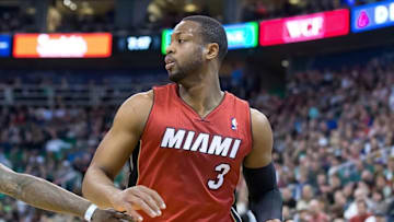 Feb 8, 2014; Salt Lake City, UT, USA; Miami Heat shooting guard Dwyane Wade (3) controls the ball during the first quarter against the Utah Jazz at EnergySolutions Arena. Mandatory Credit: Russ Isabella-USA TODAY Sports