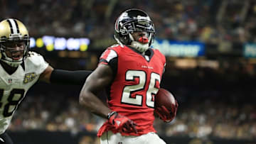 Sep 26, 2016; New Orleans, LA, USA; Atlanta Falcons running back Tevin Coleman (26) scores a touchdown past New Orleans Saints free safety Vonn Bell (48) during the third quarter of a game at the Mercedes-Benz Superdome. Mandatory Credit: Derick E. Hingle-USA TODAY Sports