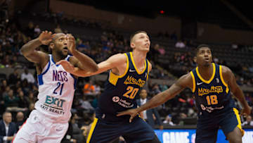 UNIONDALE, NY - NOVEMBER 4: Kamari Murphy #21 of the Long Island Nets, Jarrod Uthoff #20 of the Fort Wayne Mad Ants, DeQuan Jones #18 of the Fort Wayne Mad Ants during an NBA G-League game on November 4, 2017 at NYCB Live, Home of Nassau Memorial Veterans Coliseum in Uniondale, New York. NOTE TO USER: User expressly acknowledges and agrees that, by downloading and or using this photograph, User is consenting to the terms and conditions of the Getty Images License Agreement. Mandatory Copyright Notice: Copyright 2017 NBAE (Photo by Mike Lawrence/NBAE via Getty Images)