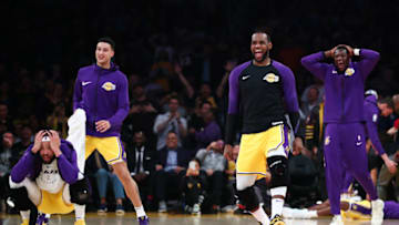 LOS ANGELES, CALIFORNIA - MARCH 26: LeBron James #23 and the Los Angeles Lakers bench react after a play by Lance Stephenson #6 against the Washington Wizards during the first half at Staples Center on March 26, 2019 in Los Angeles, California. (Photo by Yong Teck Lim/Getty Images)