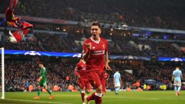 MANCHESTER, ENGLAND - APRIL 10: Roberto Firmino of Liverpool celebrates after scoring his sides second goal during the UEFA Champions League Quarter Final Second Leg match between Manchester City and Liverpool at Etihad Stadium on April 10, 2018 in Manchester, England. (Photo by Laurence Griffiths/Getty Images,)