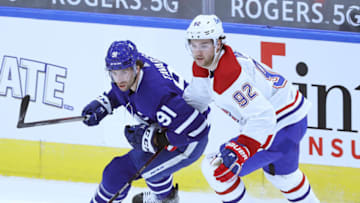 TORONTO, ON - JANUARY 13: Jonathan Drouin #92 of the Montreal Canadiens skates against John Tavares #91 of the Toronto Maple Leafs during an NHL game at Scotiabank Arena on January 13, 2021 in Toronto, Ontario, Canada. The Maple Leafs defeated the Canadiens 5-4 in overtime. (Photo by Claus Andersen/Getty Images)