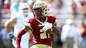 CHESTNUT HILL, MA - SEPTEMBER 1:Lukas Denis #21 of the Boston College Eagles runs for a touchdown against the Massachusetts Minutemen at Alumni Stadium on September 1, 2018 in Chestnut Hill, Massachusetts.(Photo by Maddie Meyer/Getty Images)