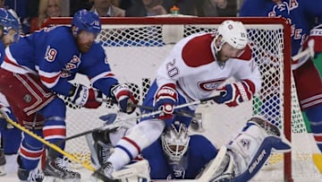 NEW YORK, NY - MAY 29: Henrik Lundqvist #30 of the New York Rangers defends the net against Thomas Vanek #20 of the Montreal Canadiens during Game Six of the Eastern Conference Final in the 2014 NHL Stanley Cup Playoffs at Madison Square Garden on May 29, 2014 in New York City. Rangers defeated the Canadiens 1-0. (Photo by Bruce Bennett/Getty Images)