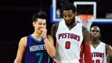 Oct 21, 2015; Auburn Hills, MI, USA; Detroit Pistons center Andre Drummond (0) and Charlotte Hornets guard Jeremy Lin (7) share a laugh during the fourth quarter at The Palace of Auburn Hills. Charlotte won 99-94. Mandatory Credit: Tim Fuller-USA TODAY Sports
