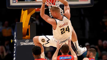 DENVER, CO - OCTOBER 05: Mason Plumlee #24 of the Denver Nuggets dunks the ball over Terrico White # 23, Tom Jervis #13 and Nick Kay #3 of the Perth Wildcats at the Pepsi Center on October 5, 2018 in Denver, Colorado. NOTE TO USER: User expressly acknowledges and agrees that, by downloading and or using this photograph, User is consenting to the terms and conditions of the Getty Images License Agreement. (Photo by Matthew Stockman/Getty Images)