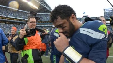 Jan 18, 2015; Seattle, WA, USA; Seattle Seahawks quarterback Russell Wilson (3) celebrates following the overtime victory over the Green Bay Packers in the NFC Championship Game at CenturyLink Field. The Seahawks defeated the Packers 28-22 in overtime. Mandatory Credit: Kirby Lee-USA TODAY Sports