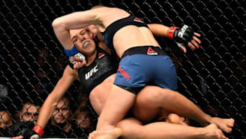 NEW YORK, NY - NOVEMBER 04: Rose Namajunasfights Joanna Jedrzejczyk of Poland in their UFC women's strawweight championship bout during the UFC 217 event at Madison Square Garden on November 4, 2017 in New York City. (Photo by Jeff Bottari/Zuffa LLC/Zuffa LLC via Getty Images)