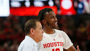 HOUSTON, TEXAS - FEBRUARY 10: Dejon Jarreau #13 of the Houston Cougars talks with head coach Kelvin Sampson of the Houston Cougars in the final seconds of the game at Fertitta Center on February 10, 2019 in Houston, Texas. (Photo by Bob Levey/Getty Images)