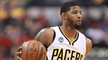 Apr 23, 2016; Indianapolis, IN, USA; Indiana Pacers forward Paul George (13) controls the ball against the Toronto Raptors during the first quarter in game four of the first round of the 2016 NBA Playoffs at Bankers Life Fieldhouse. Mandatory Credit: Brian Spurlock-USA TODAY Sports
