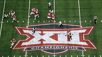 ARLINGTON, TX - DECEMBER 02: Baker Mayfield #6 of the Oklahoma Sooners looks to pass against the TCU Horned Frogs in the first quarter during Big 12 Championship at AT&T Stadium on December 2, 2017 in Arlington, Texas. (Photo by Ronald Martinez/Getty Images)