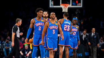 JANUARY 7: Shai Gilgeous-Alexander #2 and Chris Paul #3 of the OKC Thunder looks on during the game (Photo by Zach Beeker/NBAE via Getty Images)