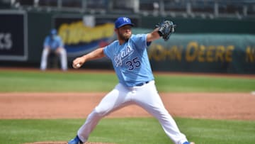 KANSAS CITY, MO - AUGUST 9: Relief pitcher Greg Holland #35 of the Kansas City Royals throws in the sixth inning Minnesota Twins at Kauffman Stadium on August 9, 2020 in Kansas City, Missouri. (Photo by Ed Zurga/Getty Images)
