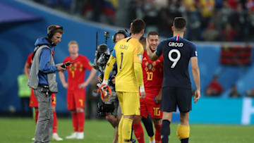 SAINT PETERSBURG, RUSSIA - JULY 10: Olivier Giroud of France consoles Eden Hazard of Belgium following Belgium's defeat in the 2018 FIFA World Cup Russia Semi Final match between Belgium and France at Saint Petersburg Stadium on July 10, 2018 in Saint Petersburg, Russia. (Photo by Catherine Ivill/Getty Images)