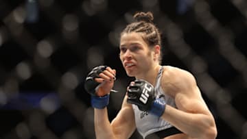 Aug 7, 2021; Houston, Texas, USA; Melissa Gatto (blue gloves) fights Victoria Leonardo (red gloves) during UFC 265 at Toyota Center. Mandatory Credit: Troy Taormina-USA TODAY Sports