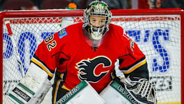 Sep 30, 2016; Calgary, Alberta, CAN; Calgary Flames goalie Tyler Parsons (82) guards his net against Vancouver Canucks during a preseason hockey game at Scotiabank Saddledome. Calgary Flames won 2-1. Mandatory Credit: Sergei Belski-USA TODAY Sports