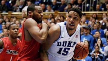 Nov 8, 2014; Durham, NC, USA; Duke Blue Devils center Jahlil Okafor (15) drives against Central Missouri Mules forward Brennen Hughes (10) in their game at Cameron Indoor Stadium. Mandatory Credit: Mark Dolejs-USA TODAY Sports