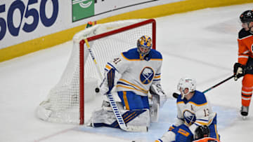 Mar 17, 2022; Edmonton, Alberta, CAN; Buffalo Sabres goalie Craig Anderson (41) reacts after lEdmonton Oilers defenceman Tyson Barrie (22) scored a goal as Buffalo Sabres defenceman Mark Pysyk (13) looks on during the third period at Rogers Place. Oilers won the game 6-1. Mandatory Credit: Walter Tychnowicz-USA TODAY Sports