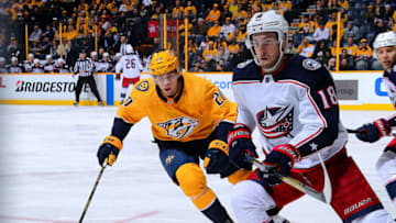 NASHVILLE, TN - APRIL 07: Miikka Salomaki #20 of the Nashville Predators skates against Pierre-Luc Dubois #18 of the Columbus Blue Jackets during the second period at Bridgestone Arena on April 7, 2018 in Nashville, Tennessee. (Photo by Frederick Breedon/Getty Images)
