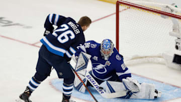 TAMPA, FL - JANUARY 27: Tampa Bay Lightning goaltender Andrei Vasilevskiy (88) makes a save on a shot from Winnipeg Jets forward Blake Wheeler (26) during the GEICO NHL Save Streak competition during the NHL All-Star Skills Competition on January 27, 2018 at Amalie Arena in Tampa, FL. (Photo by Mark LoMoglio/Icon Sportswire via Getty Images)