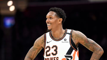 CLEVELAND, OHIO - FEBRUARY 09: Lou Williams #23 of the LA Clippers reacts to a teammate during the second half against the Cleveland Cavaliers at Rocket Mortgage Fieldhouse on February 09, 2020 in Cleveland, Ohio. The Clippers defeated the Cavaliers 133-92. NOTE TO USER: User expressly acknowledges and agrees that, by downloading and/or using this photograph, user is consenting to the terms and conditions of the Getty Images License Agreement. (Photo by Jason Miller/Getty Images)