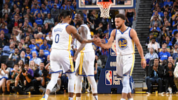 SAN FRANCISCO, CA - OCTOBER 24: D'Angelo Russell #0 and Stephen Curry #30 of the Golden State Warriors high five each other during a game against the LA Clippers on October 24, 2019 at Chase Center in San Francisco, California. NOTE TO USER: User expressly acknowledges and agrees that, by downloading and/or using this Photograph, user is consenting to the terms and conditions of the Getty Images License Agreement. Mandatory Copyright Notice: Copyright 2019 NBAE (Photo by Andrew D. Bernstein/NBAE via Getty Images)
