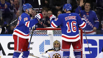 NEW YORK, NEW YORK - OCTOBER 27: Pavel Buchnevich #89 of the New York Rangers celebrates his third period goal along with Ryan Strome #16 against Jaroslav Halak #41 of the Boston Bruins during the third period at Madison Square Garden on October 27, 2019 in New York City. The Bruins defeated the Rangers 7-4. (Photo by Bruce Bennett/Getty Images)