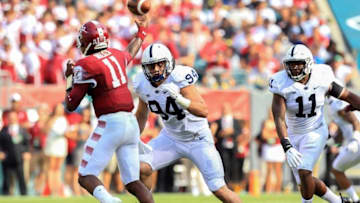Sep 5, 2015; Philadelphia, PA, USA; Penn State Nittany Lions defensive end Evan Schwan (94) pressures Temple Owls quarterback P.J. Walker (11) during the second quarter at Lincoln Financial Field. Mandatory Credit: Matthew O