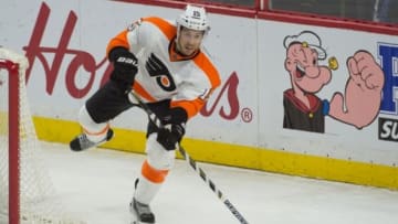 Nov 21, 2015; Ottawa, Ontario, CAN; Philadelphia Flyers defenseman Michael Del Zotto (15) shoots the puck in the third period against the Ottawa Senators at Canadian Tire Centre. The Senators defeated the Flyers 4-0. Mandatory Credit: Marc DesRosiers-USA TODAY Sports
