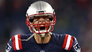 FOXBORO, MA - OCTOBER 22: Tom Brady #12 of the New England Patriots runs out onto the field before the game against the Atlanta Falcons at Gillette Stadium on October 22, 2017 in Foxboro, Massachusetts. (Photo by Maddie Meyer/Getty Images)